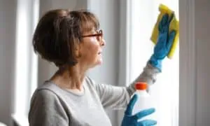 woman cleaning windows